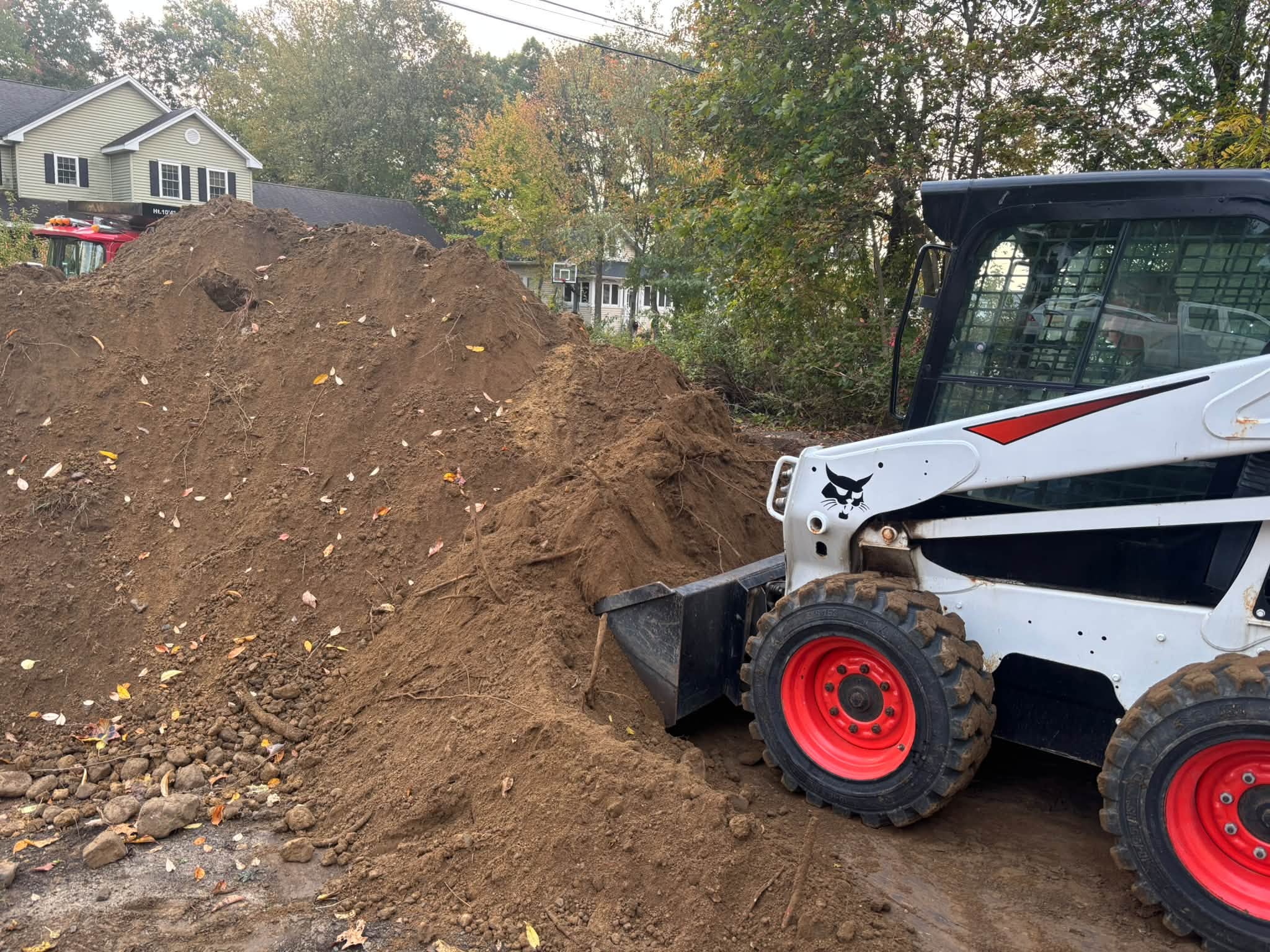 Excavation in progress — Auburn, MA regrading project
